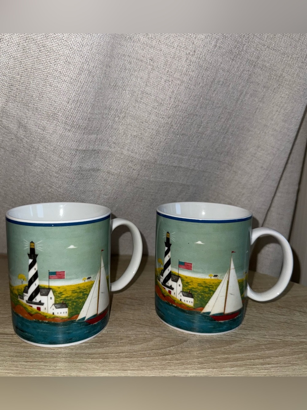 Set of 2 vintage Warren Kimble lighthouse coffee mugs nautical style